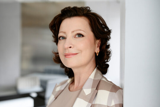 Portrait of confident businesswomansmiling in the office