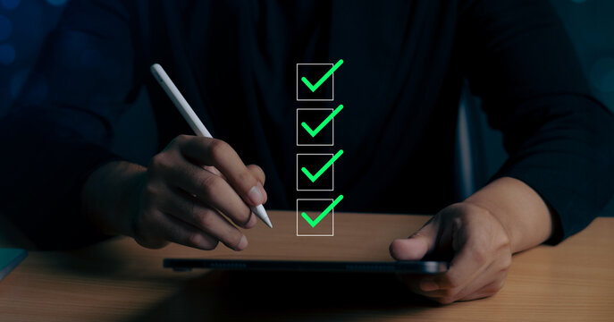 Businessman tick correct sign mark for document approve, project acceptance and quality assurance concept, checklist, online survey, online exam.	
