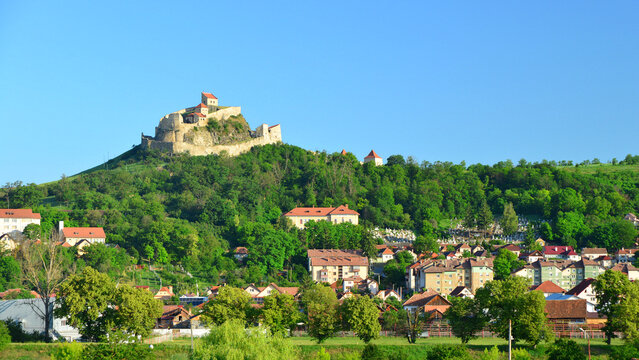 A view of Rupea, a town in Transylvania, with its medieval citadel perched on the hilltop.