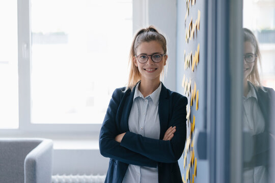 Portrait of a confident young businesswoman, standing in office
