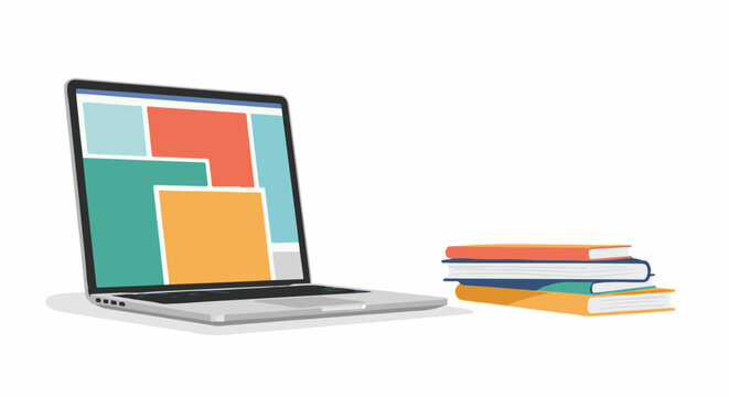 A laptop displays colorful blocks beside a stack of books
