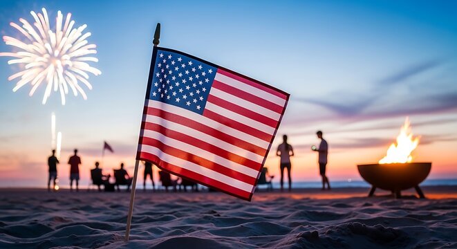 American flag on a beach with people and a fire pit during a 4th of july celebration