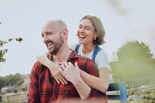 Smiling couple enjoying time together on an allotment in London
