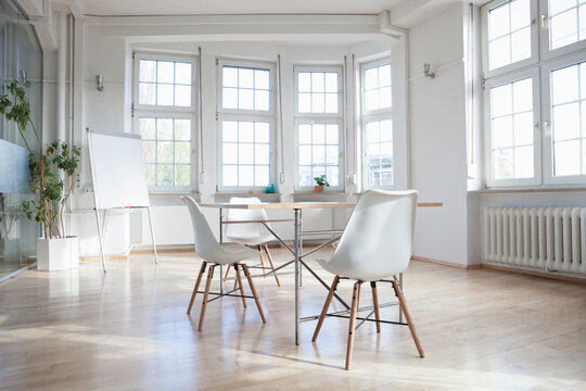 Empty boardroom with flipchart