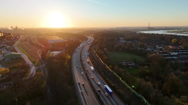 Orbiting drone move linking A42 traffic and steel plant