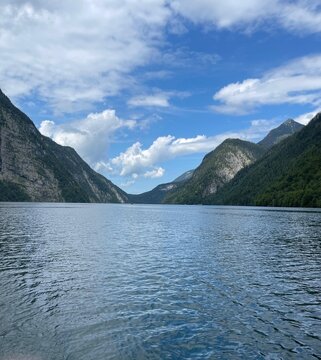 Scenic view of K&ouml;nigssee lake surrounded by steep alpine mountains, Berchtesgaden, Germany