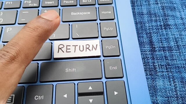Closeup of customer press, push or click key with return word written on laptop computer keyboard. Digital ecommerce business service online purchase and shopping payment product return policy concept
