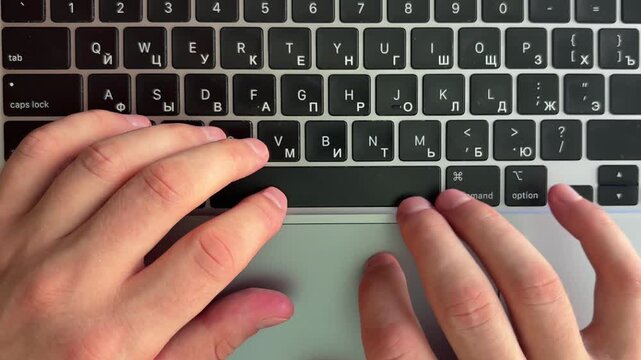 Close-up video of a laptop keyboard used for work, communication and digital tasks. Technology and productivity concept representing modern office, remote work and everyday computing.