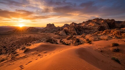 Obraz premium Arid landscape at sunset, desert dunes and rock formations, golden hour glow