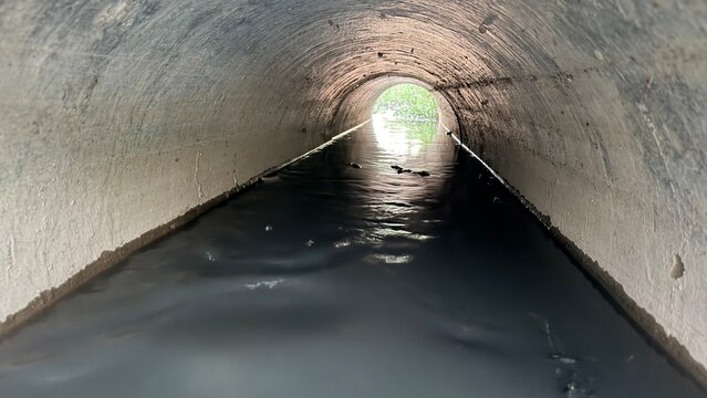 concrete culvert system channels water efficiently, preventing flooding and erosion in roads and landscapes
