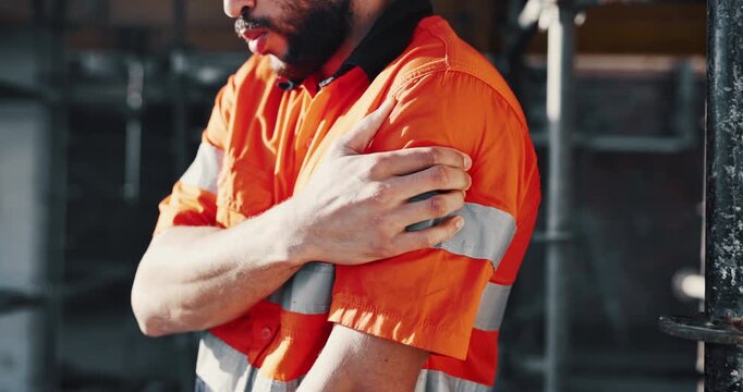 Construction, arm pain or hands on site with massage, joint issue or labor injury in building project. Hurt, man or engineer with accident, muscle strain or arthritis in infrastructure development.