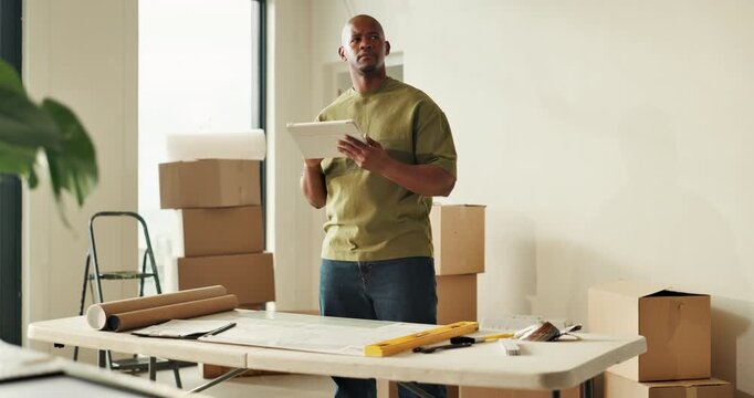 Tablet, thinking and man in new home with moving for online shopping, planning or furniture order. Digital tech, problem solving and black person with decision for renovation, decor app or remodeling