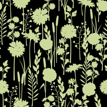 Floral seamless pattern with wild flowers and herbs. Meadow flowers silhouettes on a black background. Vector seamless floral print