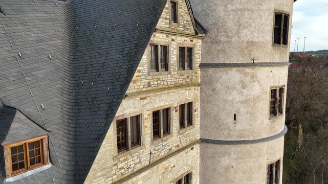 Tower roof close up with vertical drone rise