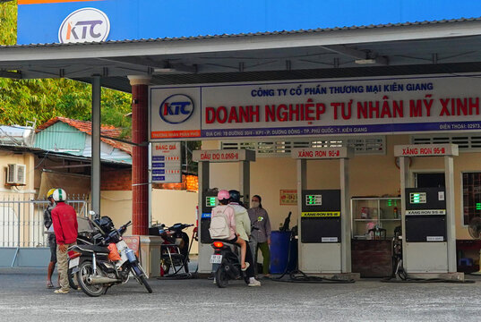 Gas station in Asia. People fill gas at fuel station. Customers are filling their motorcycles and vehicles at a KTC petrol station. Gasoline gas in Island Phu Quoc, Vietnam, Jan 2, 2026.