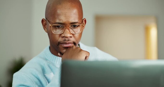 Black man, laptop and thinking in lounge with remote work, review and report for project management. Person, freelance writer and computer with reflection or editing for creative proposal in home