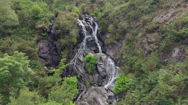 Cascada de Santo Estevo do Ermo Waterfall In Barreiros, Galicia, Spain. Tracking Shot
