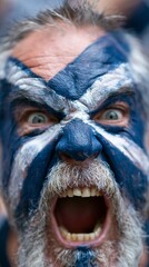 Obraz premium Passionate Scotland supporter with half their face painted blue featuring a striking diagonal cross eyes wide open in a moment of sports excitement.
