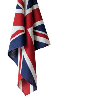 Large british flag with visible woven fabric textures cascading down from the top left corner against a minimalist white background, sense of national pride
