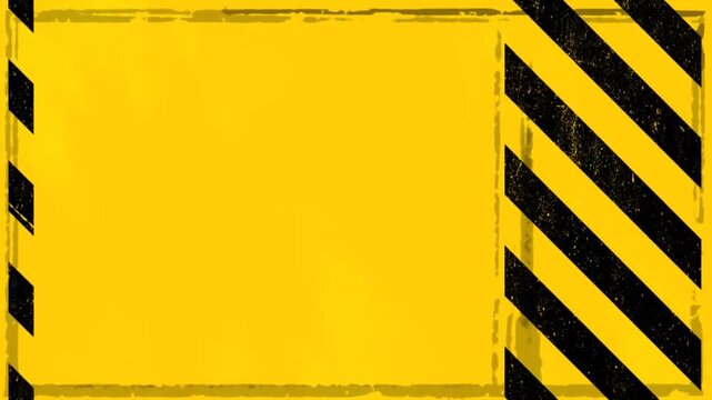 Yellow and black hazard stripes warning background with copy space.