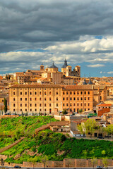 Fototapeta premium Spain. Toledo with Alcazar castle at sunset, Castilla-La Mancha. Summer tourism and travel 