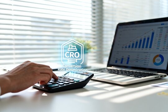 Businessman Using Calculator with CRO Graph on Laptop