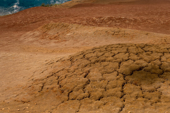 Cracked arid terrain in drought affected landscape &ndash; climate change concept
