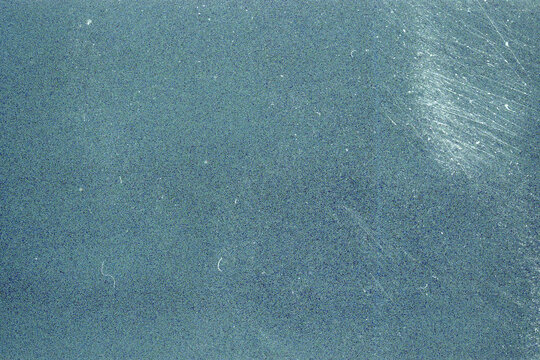 Blank grained film strip texture background with heavy grain, dust and light leak