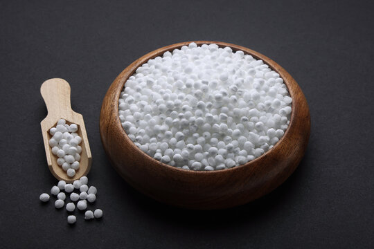 Indian food called Sabudana whole or Tapioca Sago Pearls, Saboodana in wooden bowl isolated on black background 