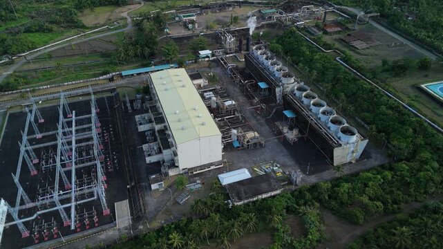 Aerial shot captures geothermal power plant from above. Tabaco City, Philippines. Ideal for educational and corporate concepts.