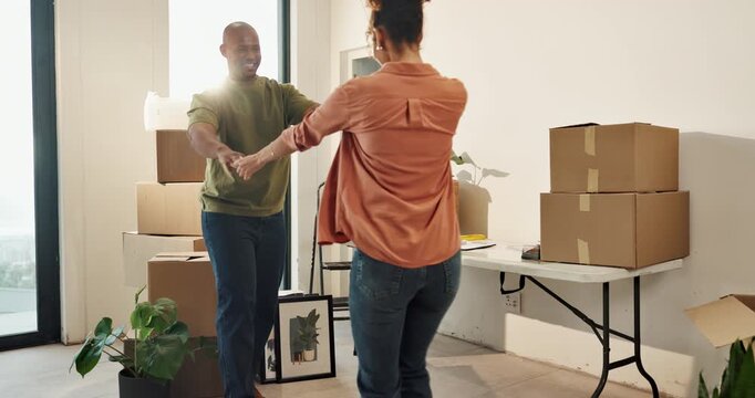 Support, dancing and couple with smile in new home, relocation or property ownership for celebration. Real estate, bonding or African people with mortgage for investment, milestone or moving together
