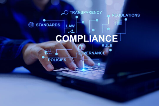 compliance concept with business person using computer to check and submit document for regulatory requirement to comply a standards