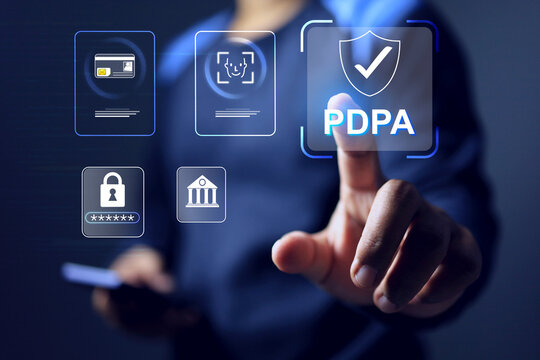 personal data protection act PDPA law concept with a man pointing on virtual screen to manage confidential identify person, biometric facial recognition