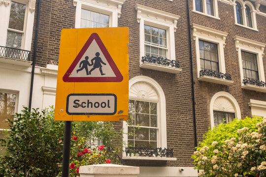UK - school warning traffic sign on residential street