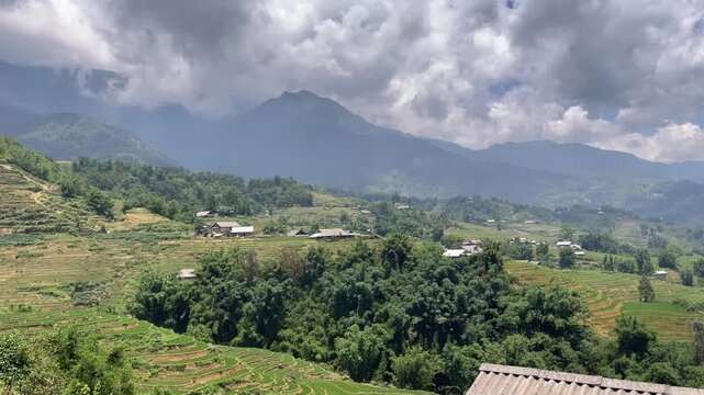 The Hmong village is located halfway up the mountain. This is a Hmong village in the Hoang Lien Son mountain range, Sapa town, Lao Cai province, Vietnam.