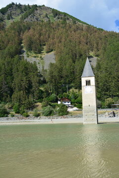 Old bell tower of the sunken church of Graun / Curon,  in lake Reschen / Resia, South Tirol, Italy