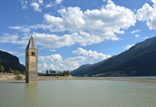 Old bell tower of the sunken church of Graun / Curon,  in lake Reschen / Resia, South Tirol, Italy