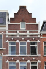 Obraz premium Amsterdam Middenweg Brick House Facade with Stepped Gable Close Up, Netherlands