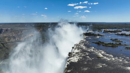 Obraz premium Explore the breathtaking view of Victoria Falls in Zimbabwe during daytime