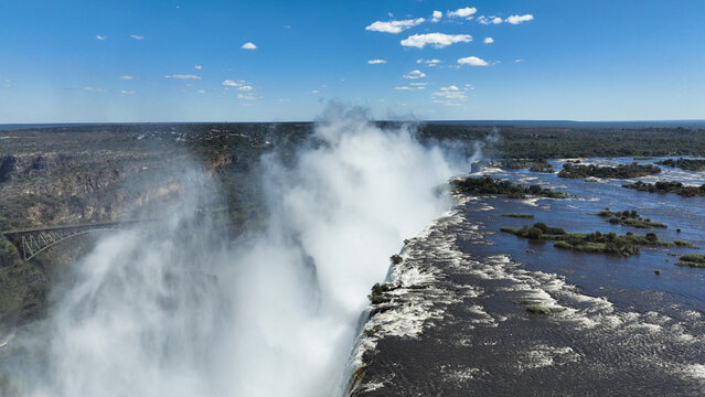 Explore the breathtaking view of Victoria Falls in Zimbabwe during daytime