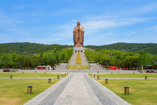 Giant bronze statue of Confucius at the Nishan Shengjing Sacred Land cultural site in Qufu, Shandong, China