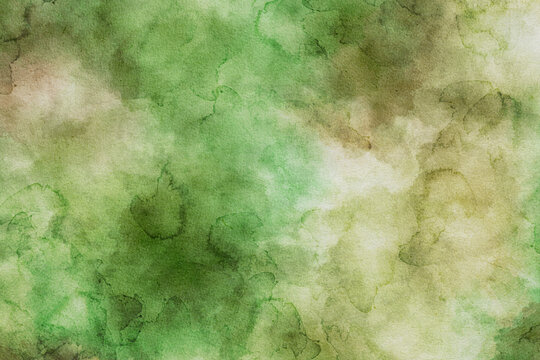 Watercolor abstract background with rich green natural tones. Organic artistic texture feels fresh and calming and ideal for nature inspired designs.