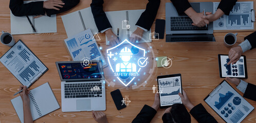 Concept of occupational health and safety. A 'Safety First' policy ensures worker protection...