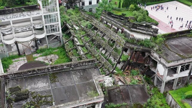 Aerial View of Collapsed Abandoned Building Overgrown With Vegetation