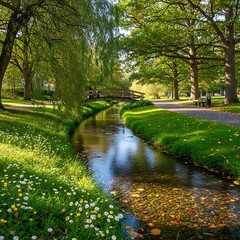 Obraz premium Sunlit Peaceful Park Stream Flowing Beneath Wooden Footbridge Among Lush Green Trees