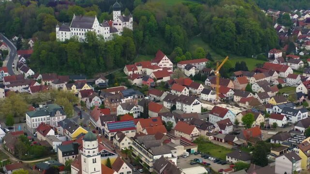 Aerial view of the city Illertissen Iller and castle V&ouml;hlinschloss in Germany on a cloudy spring day 