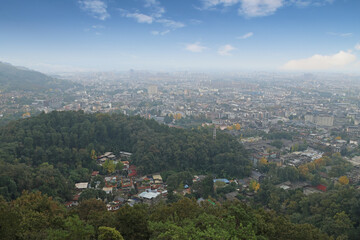Obraz premium Aerial view of Dujiangyan City from Yulei Pavilion at Yulei Mountain in autumn, Sichuan Province of China