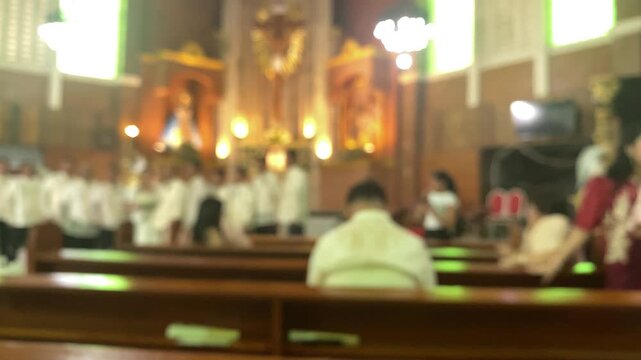Wedding photoshoot at the altar of a chapel featuring the newlywed couple along with their entourage. Blurs