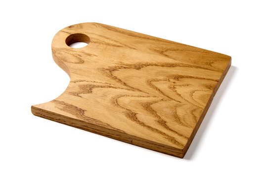 Wooden cutting board isolated on white background angle view