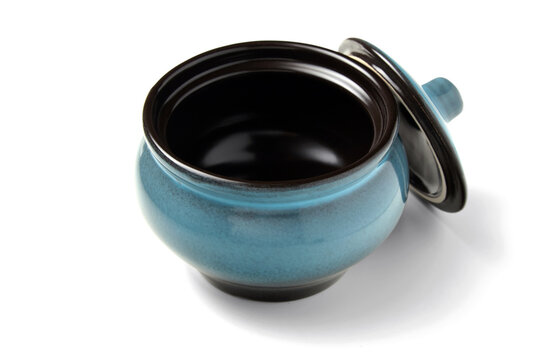 Blue ceramic pot with lid isolated on white.